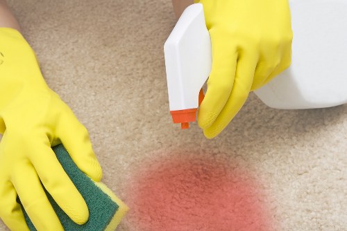 Commercial cleaner maintaining a Kingston upon Thames office reception area