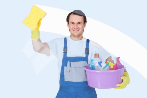 Local patio cleaning service removing moss and algae from paving