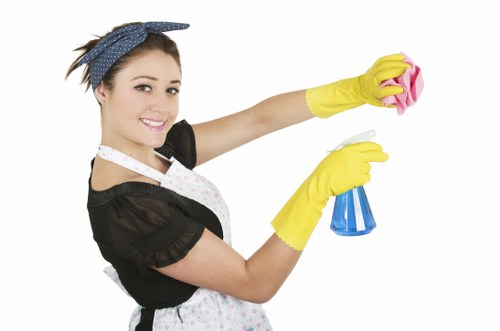 Local rug cleaner assessing delicate wool and patterned rugs